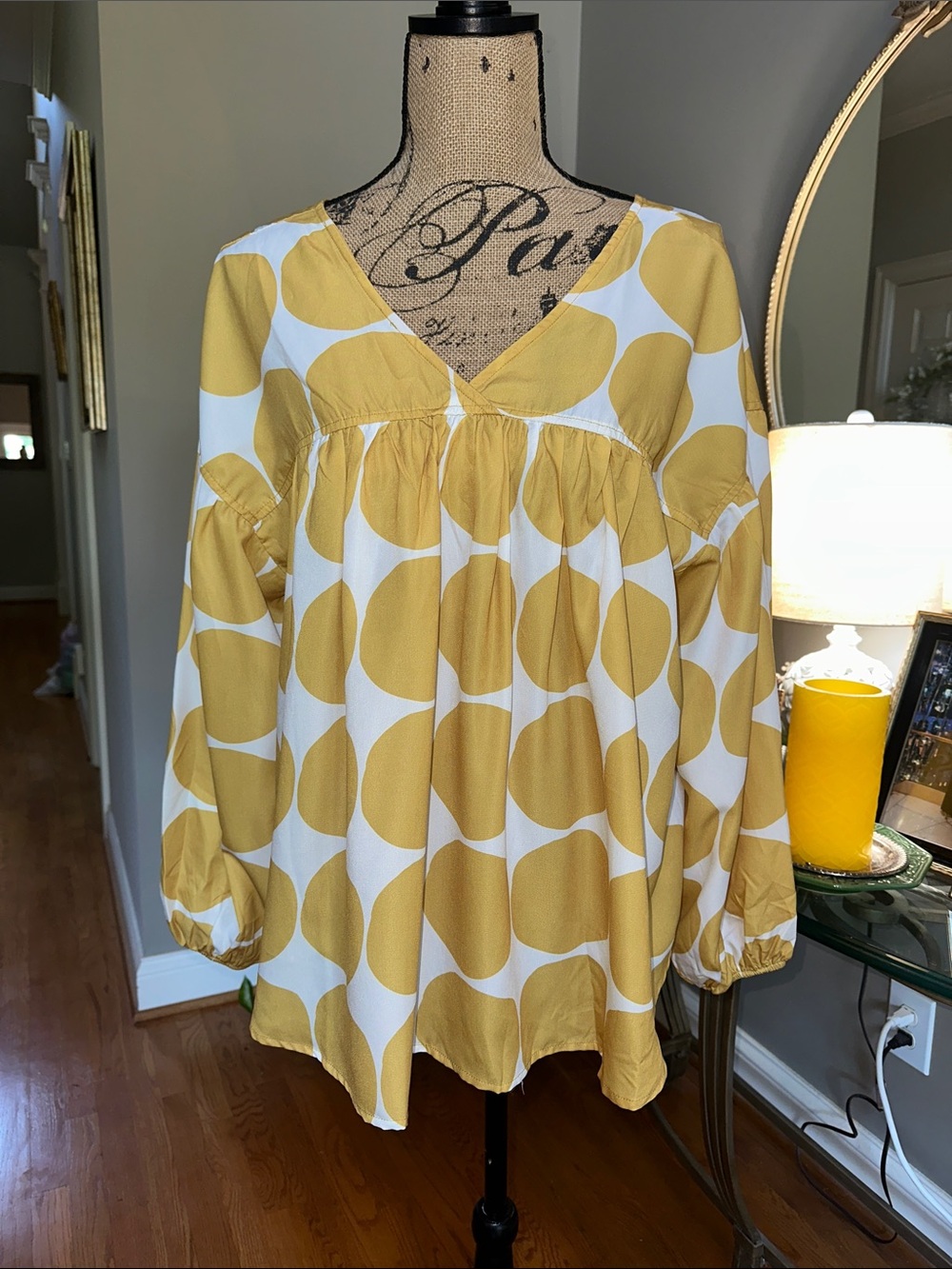 Shop the Mint V-Neck Babydoll Blouse in Mustard and White Polka Dot size M